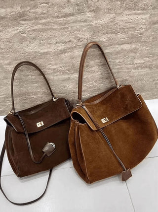 Elegant Suede Satchel with Top Handle and Twist-Lock Closure